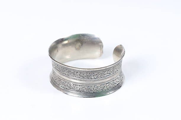 istock Silver old vintage bracelet isolated on white background 518427376
