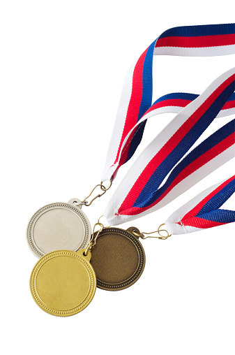 Three medals hanging from a red, white and blue ribbon isolated on white background