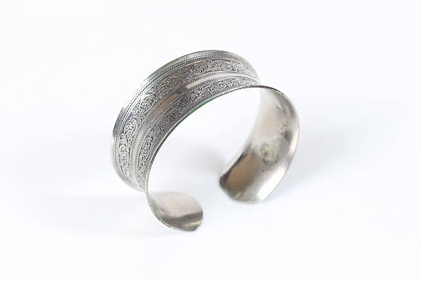 istock Silver old vintage bracelet isolated on white background 518427436