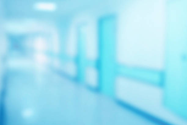 istock hospital interior corridor blurred background 518429924
