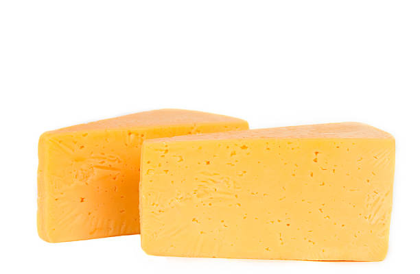 istock piece of cheese isolated 518430382
