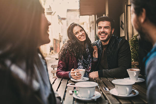 istock Group of friends talking and laughing 518430904