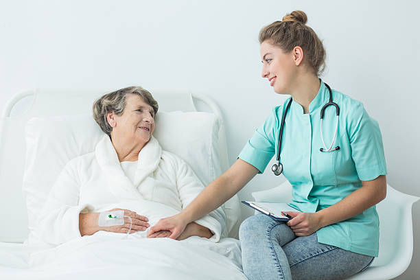 istock Hospital patient with nurse 518430952