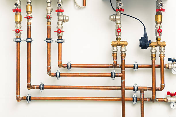 istock copper pipes in boiler-room 518432048
