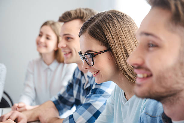 istock Positive colleagues sitting at the table 518437206