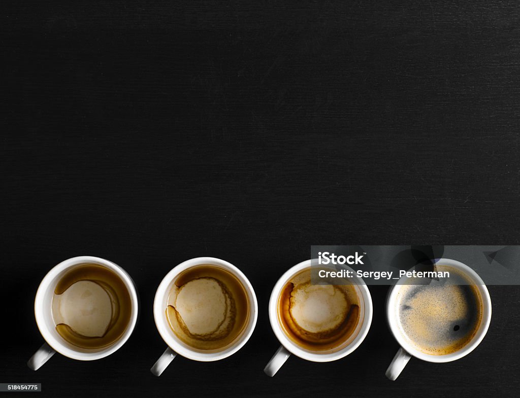 working hours. working hours. empty and full cups of fresh espresso, view from above Black Color Stock Photo