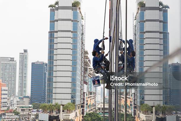 Cleaning Up Skyscraper Stock Photo - Download Image Now - Blue-collar Worker, Bucket, Building Exterior