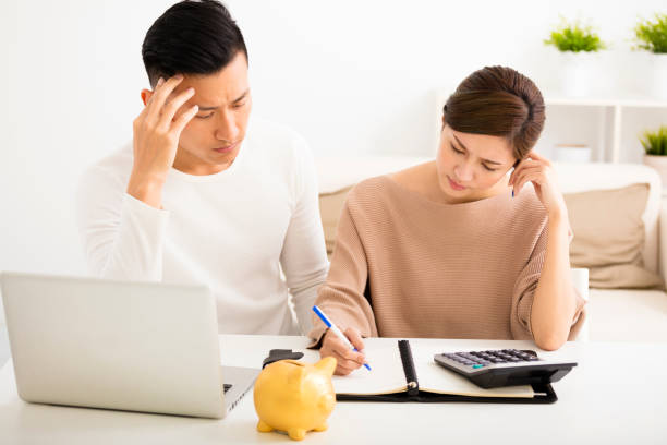 istock husband and wife with financial stress 518458906