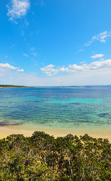 istock small cove under a blear sky in Sardinia 518459322