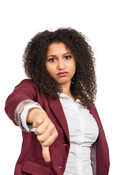 istock Woman is holding her thumb down 518459554