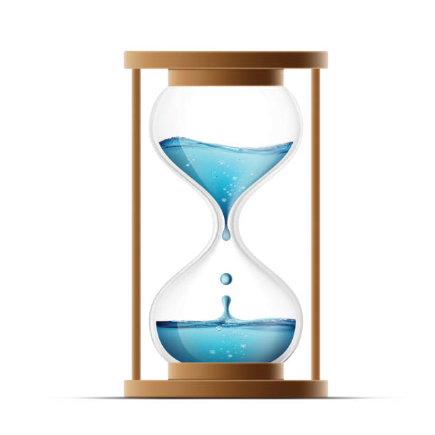 istock Hourglass with water. Water drips into the watch. Countdown. 518459692