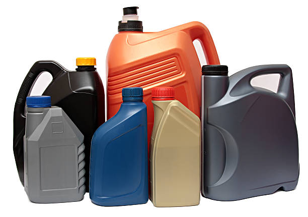 istock Plastic bottles from automobile oils isolated on white background 518461404