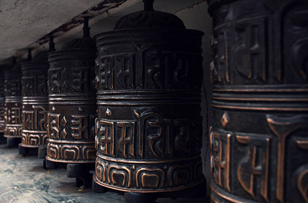 Rolls of prayer in Buddhist temples Close-up of rolls of prayer in Buddhist temples in Nepal prayer wheel nepal kathmandu buddhism stock pictures, royalty-free photos & images