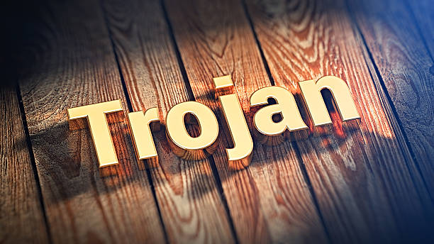 istock Word Trojan on wood planks 518462570