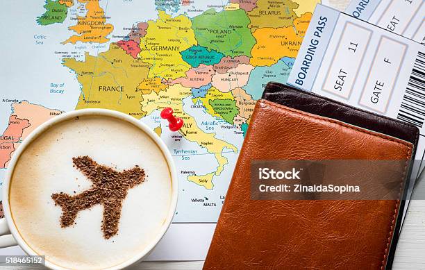 Airplane Made Of Cinnamon In Cappuccino Passports And Europe Map Stock Photo - Download Image Now