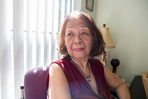 istock Happy Senior Asian Woman 518465820