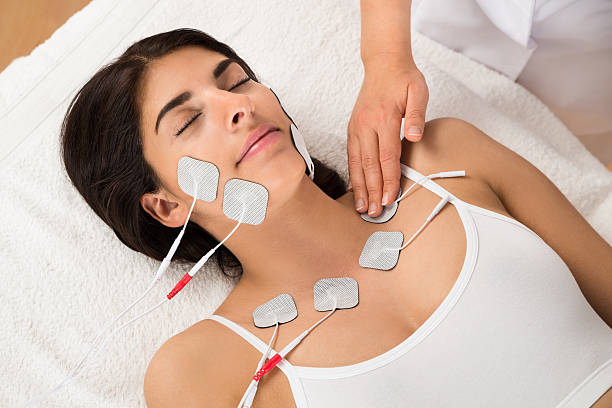 istock Woman Having Electrodes Therapy 518466074