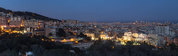 istock barcelona city spain at night 518466478