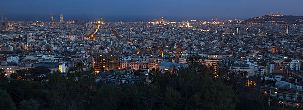 istock barcelona city spain at night 518466528