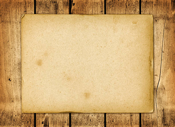 istock Blank vintage paper sheet on a wood board 518467497