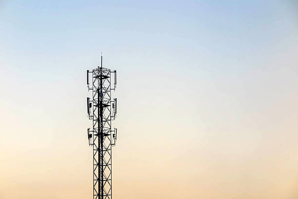 istock Telecommunication cellular tower on twilight background. Used to 518468866