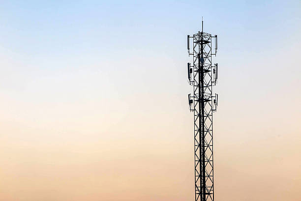 istock Telecommunication cellular tower on twilight background. Used to 518468898