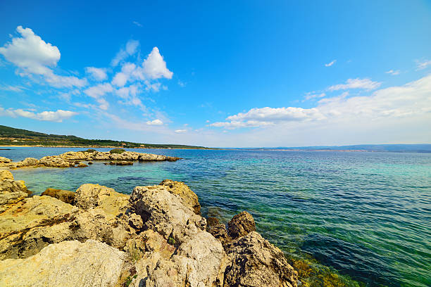 istock rocks ans blue sea in Sardinia 518469262