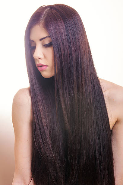 istock Young woman with long hair 518470520