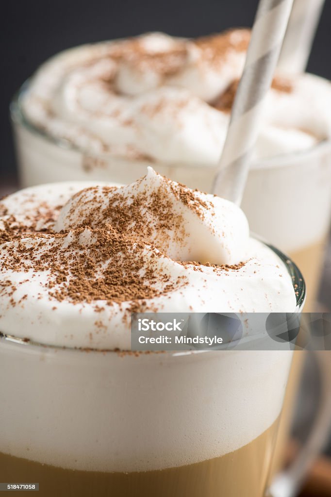 Coffee in glass Coffee in glass on the wooden background Anise Stock Photo