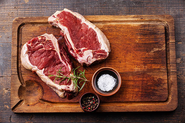 istock Raw meat Ribeye Steak and seasoning 518472841