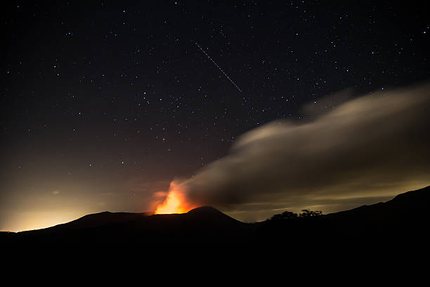 Masaya volcano view at night during an eruption. Masaya volcano view at night during an eruption. Long exposure shot. March 2016 masaya volcano stock pictures, royalty-free photos & images