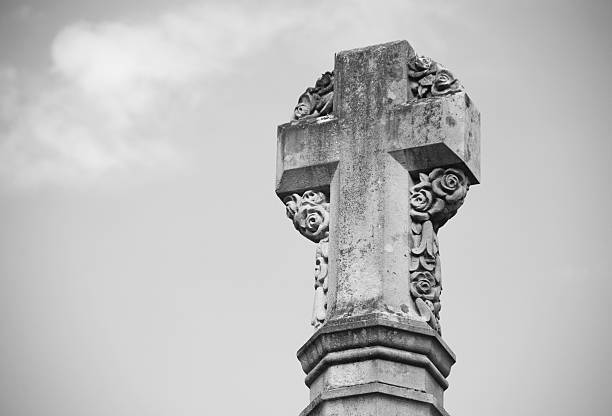 istock Stone cross war memorial outside Winchester Cathedral 518473809