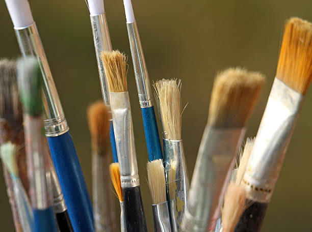 istock brushes used by a painter in painting workshop 518479827