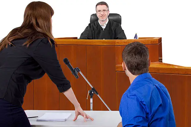 Photo of Male Being Sued in a Court Trial