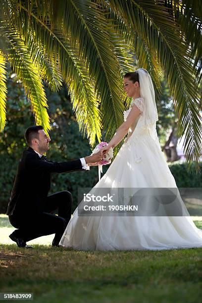 Bride And Groom In Garden Stock Photo - Download Image Now - Adult, Adults Only, Beauty In Nature