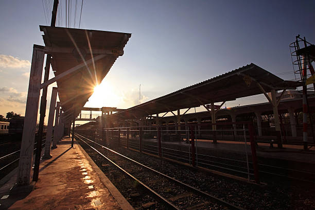 istock Train station outdoor against sun beam 518484165