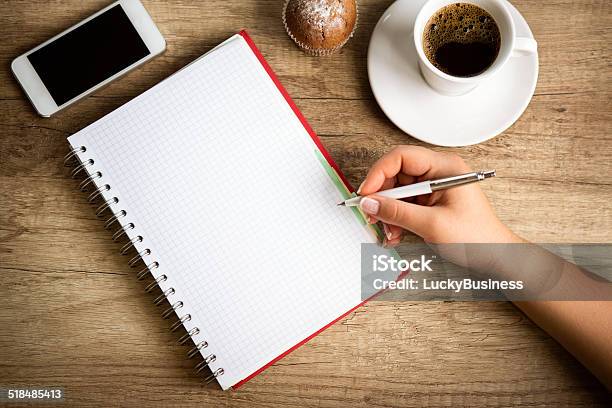 Making Notes On Coffee Break Stock Photo - Download Image Now - Business, Business Finance and Industry, Coffee - Drink