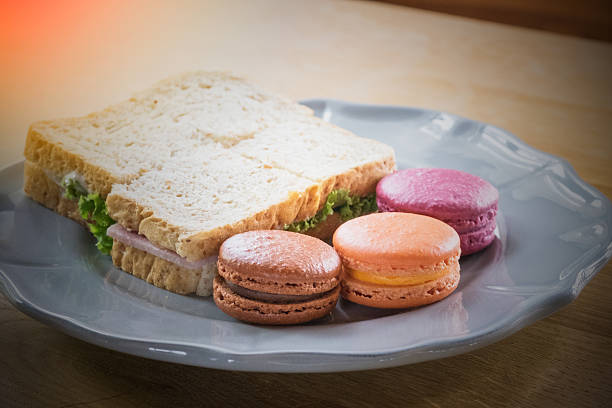 istock Abstract of colorful macaroon and sandwich ham cheese 518496544