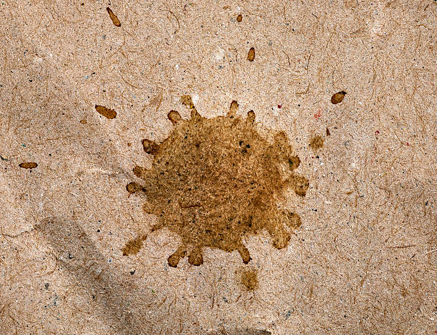 istock coffee stain on brown paper 518496818
