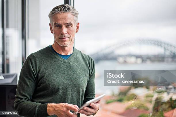 Portrait Of A Businessman With Digital Tablet In Office Stock Photo - Download Image Now