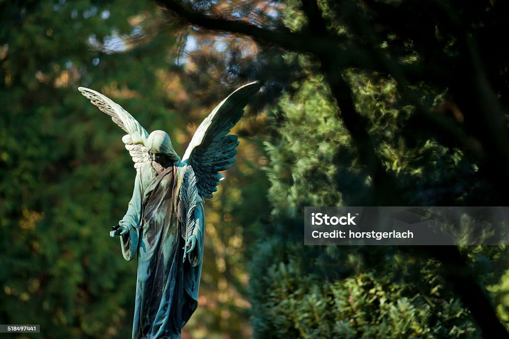 Angel statue Angel statue at the Melaten Graveyard in Cologne Angel Stock Photo