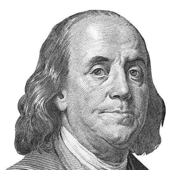 istock hundred us dollars macro portrait 518497738