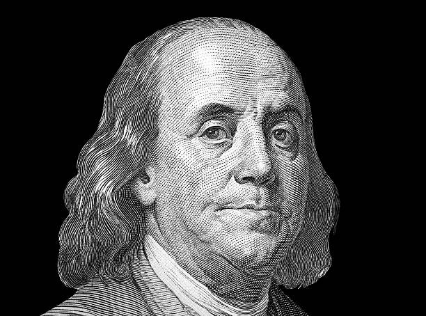 istock hundred us dollars macro portrait 518497762