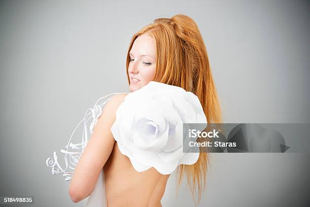 Portrait Of Redhaired Woman With Paper Flower Stock Photo - Download Image Now - Adult, Adults Only, Arts Culture and Entertainment