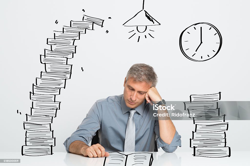 Man working till late Tired Businessman Working and Studying Till Late In Office 30-39 Years Stock Photo