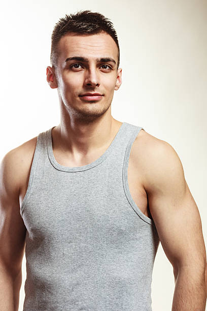 istock Handsome muscular sporty fit man portrait. 518500524