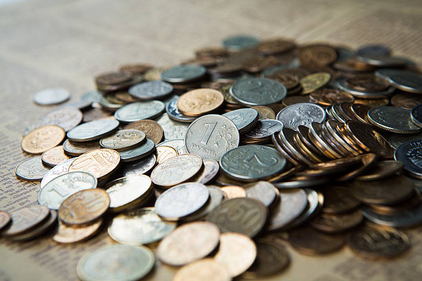 istock Russian rubles coins close up 518501422