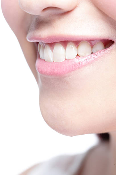 istock young woman health teeth 518502810