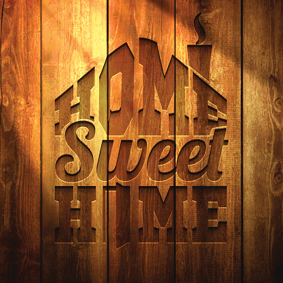 istock "Home sweet home" - Wooden Background 518503033