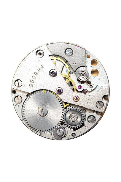 istock The clock mechanism on a white background 518503726